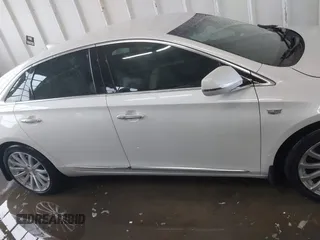 2018 Cadillac XTS Luxury z VIN 2G61M5S38J9156679, wystawiony jako IAAI lot #41574733 z przebiegiem 65 637 mil mil oraz . Historia ofert i sprzedaży dostępna na DreamBid. Obrazek 13.