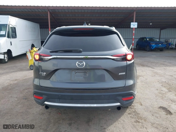 2016 Mazda CX-9 Signature with VIN JM3TCBEY7G0112486, listed as a IAAI auction lot 41592723 with 91,392 mi miles. Bid and sale history available at carsss.com. Image 16.