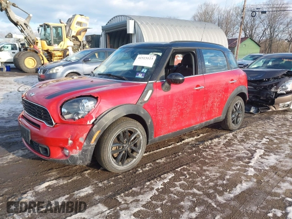 2013 MINI Countryman S z VIN WMWZC3C58DWP22372, wystawiony jako IAAI lot #41523123 z przebiegiem 50 410 mil mil oraz . Historia ofert i sprzedaży dostępna na DreamBid. Obrazek 2.
