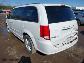 2016 Dodge Grand Caravan SXT with VIN 2C4RDGCG2GR390001, listed as a IAAI auction lot 41943622 with 127,328 mi miles. Bid and sale history available at carsss.com. Image 3.