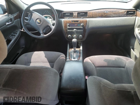 2014 Chevrolet Impala LS with VIN 2G1WA5E31E1171237, listed as a Copart auction lot 61774405 with 141,838 mi miles and Salvage title. Bid and sale history available at DreamBid. Image 8.