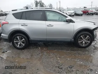 2018 Toyota RAV4 XLE with VIN 2T3RFREV2JW717351, listed as a IAAI auction lot 41576522 with 147,116 mi miles. Bid and sale history available at carsss.com. Image 13.