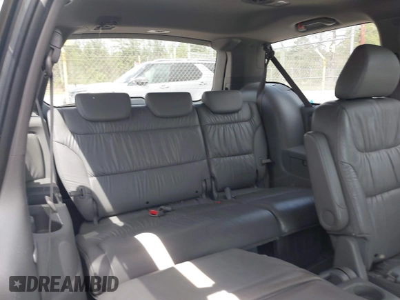 2010 Honda Odyssey EX-L with VIN 5FNRL3H76AB010388, listed as a IAAI auction lot 41963396 with 197,835 mi miles. Bid and sale history available at carsss.com. Image 8.