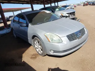 2004 Nissan Maxima SL with VIN 1N4BA41E74C852508, listed as a IAAI auction lot 42000033 with 97,251 mi miles. Bid and sale history available at carsss.com. Image 1.