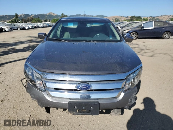 2012 Ford Fusion SEL z VIN 3FAHP0JA0CR398150, wystawiony jako Copart lot #57864455 z przebiegiem 166 046 mil mil oraz Szkoda całkowita • Salvage title. Historia ofert i sprzedaży dostępna na DreamBid. Obrazek 5.