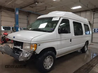 1997 Ford Econoline Commercial with VIN 1FDEE1464VHB97349, listed as a IAAI auction lot 41328090 with 72,788 mi miles. Bid and sale history available at carsss.com. Image 2.