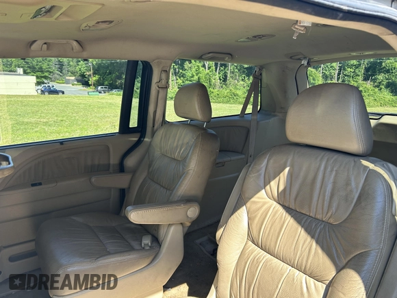 2009 Honda Odyssey Touring with VIN 5FNRL38819B025126, listed as a IAAI auction lot 42219263 with 187,191 mi miles and . Bid and sale history available at carsss.com. Image 8.
