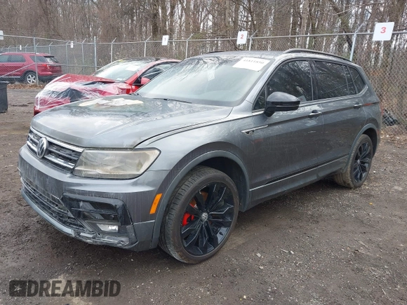 2021 Volkswagen Tiguan SE with VIN 3VV2B7AX5MM126415, listed as a IAAI auction lot 41811850 with Not Provided miles and . Bid and sale history available at DreamBid. Image 2.