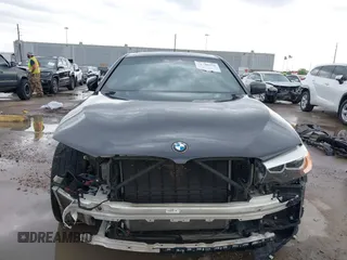 2020 BMW 5 Series 530i with VIN WBAJR3C08LWW77822, listed as a IAAI auction lot 41880376 with 52,533 mi miles and . Bid and sale history available at carsss.com. Image 6.
