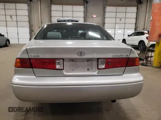 2000 Toyota Camry CE z VIN JT2BG22K1Y0483646, wystawiony jako Copart lot #53129705 z przebiegiem 187 418 mil mil oraz Szkoda całkowita • Salvage title. Historia ofert i sprzedaży dostępna na DreamBid. Obrazek 6.