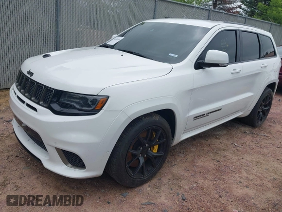 2021 Jeep Grand Cherokee Trackhawk with VIN 1C4RJFN95MC843131, listed as a IAAI auction lot 42688185 with 16,391 mi miles and . Bid and sale history available at DreamBid. Image 17.