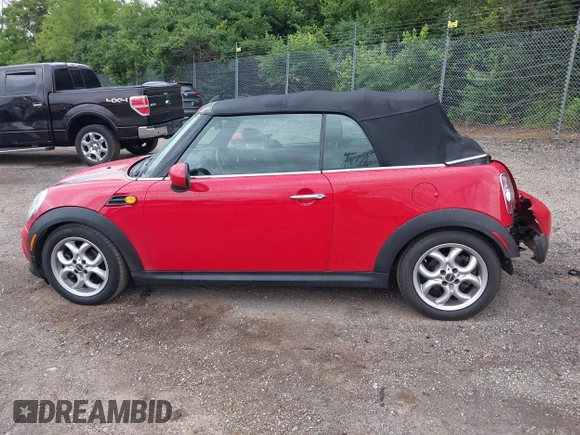 2011 MINI Convertible with VIN WMWZN3C59BTZ89447, listed as a IAAI auction lot 42313009 with 62,009 mi miles and . Bid and sale history available at DreamBid. Image 15.