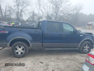2006 Ford F-150 XLT with VIN 1FTPW04536KC60389, listed as a IAAI auction lot 41137982 with 218,741 mi miles. Bid and sale history available at carsss.com. Image 13.