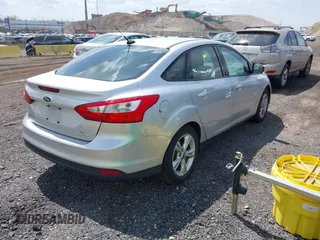 2013 Ford Focus SE with VIN 1FADP3F28DL307076, listed as a IAAI auction lot 42098620 with 182,555 mi miles. Bid and sale history available at carsss.com. Image 4.
