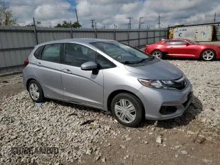 2019 Honda Fit LX z VIN 3HGGK5H47KM722595, wystawiony jako Copart lot #56819975 z przebiegiem 31 371 mil mil oraz Szkoda całkowita • Salvage title. Historia ofert i sprzedaży dostępna na DreamBid. Obrazek 4.