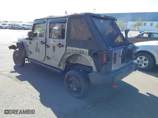 2015 Jeep Wrangler Unlimited Sport with VIN 1C4BJWDG7FL587014, listed as a IAAI auction lot 40641034 with 81,045 mi miles. Bid and sale history available at carsss.com. Image 3.