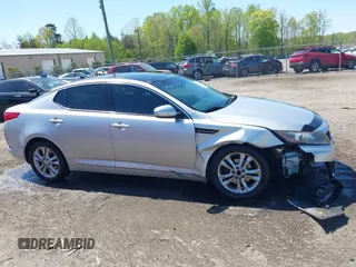 2013 Kia Optima EX with VIN 5XXGN4A73DG108068, listed as a IAAI auction lot 42059774 with 210,179 mi miles and . Bid and sale history available at carsss.com. Image 13.