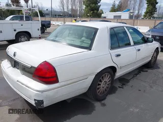 2010 Mercury Grand Marquis LS z VIN 2MEBM7FV4AX618013, wystawiony jako IAAI lot #41652851 z przebiegiem 281 919 mil mil oraz . Historia ofert i sprzedaży dostępna na DreamBid. Obrazek 4.