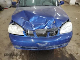 2005 Suzuki Forenza S z VIN KL5JD56Z85K231581, wystawiony jako Copart lot #78122504 z przebiegiem 138 746 mil mil oraz Szkody całkowita. Historia ofert i sprzedaży dostępna na DreamBid. Obrazek 11.