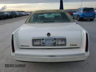 1999 Cadillac DeVille z VIN 1G6KD54Y8XU790082, wystawiony jako Copart lot #87709165 z przebiegiem 112 485 mil mil oraz Czysty tytuł • Clean title. Historia ofert i sprzedaży dostępna na DreamBid. Obrazek 6.