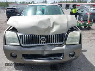 2004 Mercury Mountaineer Convenience z VIN 4M2ZU66W84UJ20034, wystawiony jako IAAI lot #41947130 z przebiegiem 193 468 mil mil oraz . Historia ofert i sprzedaży dostępna na DreamBid. Obrazek 6.