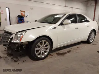 2009 Cadillac CTS AWD w/1SB with VIN 1G6DT57VX90110769, listed as a IAAI auction lot 41696744 with 164,127 mi miles. Bid and sale history available at carsss.com. Image 2.