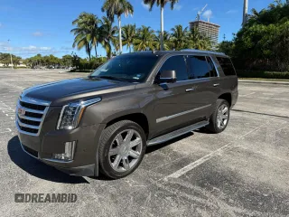 2020 Cadillac Escalade Luxury z VIN 1GYS3BKJ8LR154516, wystawiony jako Copart lot #59628455 z przebiegiem 72 098 mil mil oraz Czysty tytuł • Clean title. Historia ofert i sprzedaży dostępna na DreamBid. Obrazek 2.