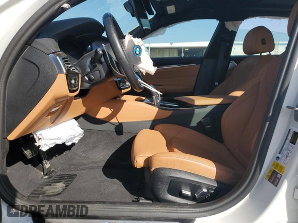 2023 BMW 5 Series 530e with VIN WBA13AG02PCL73814, listed as a Copart auction lot 86818824 with Not provided miles and Salvage title. Bid and sale history available at DreamBid. Image 7.
