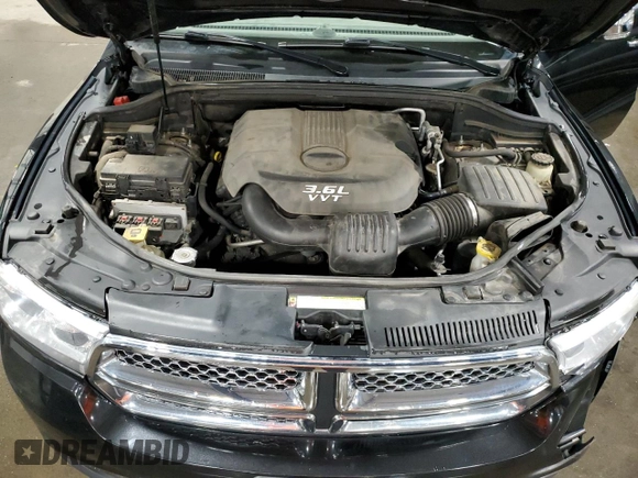 2012 Dodge Durango Citadel z VIN 1C4RDJEG4CC170002, wystawiony jako Copart lot #50833975 z przebiegiem 215 139 mil mil oraz Szkoda całkowita • Salvage title. Historia ofert i sprzedaży dostępna na DreamBid. Obrazek 13.