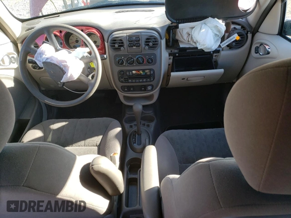 2002 Chrysler PT Cruiser Touring with VIN 3C4FY58B42T292814, listed as a Copart auction lot 81101984 with 57,293 mi miles and Salvage Title. Bid and sale history available at DreamBid. Image 8.