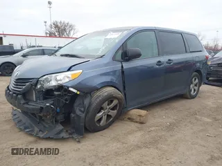 2015 Toyota Sienna L with VIN 5TDZK3DC6FS542457, listed as a IAAI auction lot 41072508 with 167,509 mi miles and . Bid and sale history available at DreamBid. Image 2.