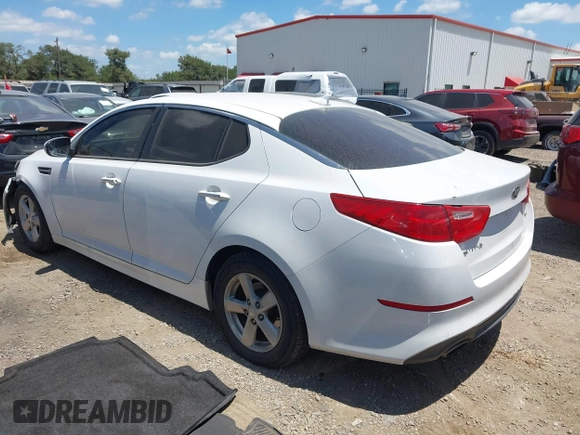 2015 Kia Optima LX with VIN KNAGM4A74F5605007, listed as a IAAI auction lot 42796438 with 126,819 mi miles and . Bid and sale history available at DreamBid. Image 3.
