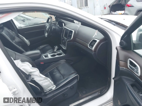 2016 Jeep Grand Cherokee High Altitude with VIN 1C4RJFCG9GC389262, listed as a IAAI auction lot 41272910 with 128,813 mi miles. Bid and sale history available at carsss.com. Image 5.