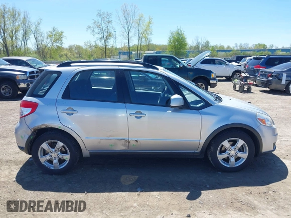 2012 Suzuki SX4 Crossover with VIN JS2YB5A36C6300510, listed as a IAAI auction lot 42140760 with 110,498 mi miles and . Bid and sale history available at carsss.com. Image 13.