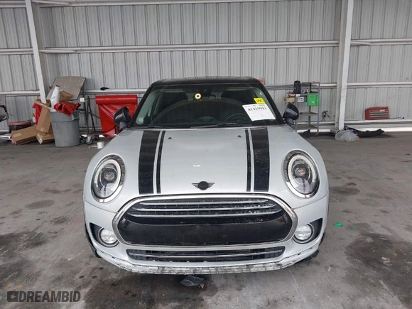 2019 MINI Cooper Clubman with VIN WMWLN5C53K2E34830, listed as a IAAI auction lot 41419983 with 64,716 mi miles. Bid and sale history available at carsss.com. Image 6.