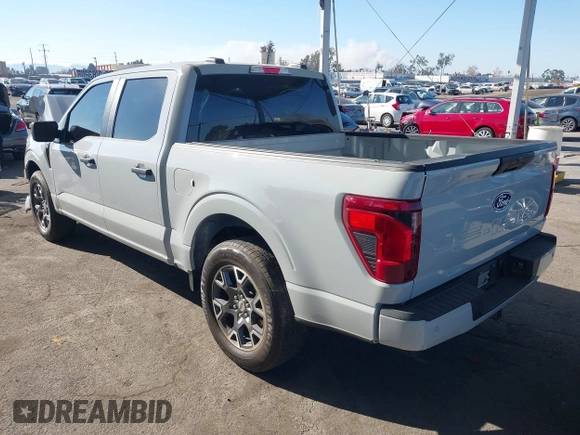2024 Ford F-150 STX with VIN 1FTEW2KP7RFA29709, listed as a IAAI auction lot 41311395 with 5,883 mi miles and . Bid and sale history available at carsss.com. Image 3.