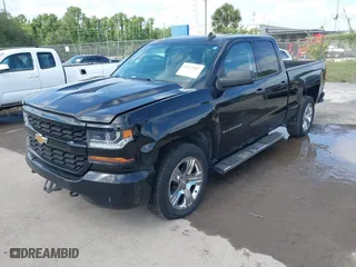 2018 Chevrolet Silverado 1500 Custom with VIN 1GCRCPEC3JZ329430, listed as a IAAI auction lot 42122097 with 199,580 mi miles. Bid and sale history available at carsss.com. Image 2.