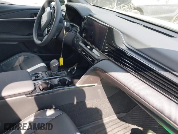 2025 Toyota Camry LE with VIN 4T1DAACK9SU084957, listed as a IAAI auction lot 41688859 with 7,396 mi miles and . Bid and sale history available at DreamBid. Image 5.