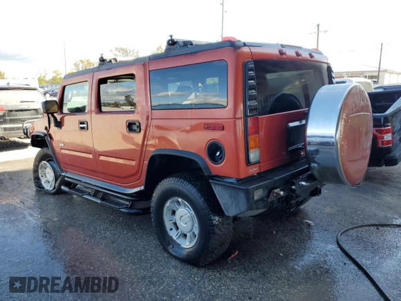2003 Hummer H2 with VIN 5GRGN23U73H141713, listed as a Copart auction lot 84285624 with 152,719 mi miles and Non Repairable. Bid and sale history available at carsss.com. Image 2.