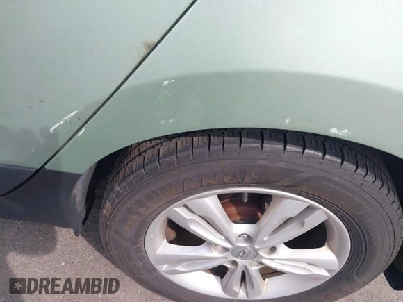 2013 Hyundai Tucson GLS with VIN KM8JU3AC7DU580229, listed as a IAAI auction lot 42127349 with 204,975 mi miles. Bid and sale history available at carsss.com. Image 6.