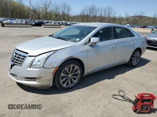 2013 Cadillac XTS Luxury z VIN 2G61P5S32D9208643, wystawiony jako Copart lot #53993145 z przebiegiem 88 713 mil mil oraz Szkody całkowita. Historia ofert i sprzedaży dostępna na DreamBid. Obrazek 1.
