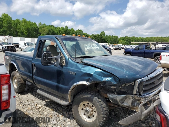 1999 Ford F-250 XL with VIN 1FTNF21FXXEB26561, listed as a Copart auction lot 54303275 with 219,108 mi miles and Salvage title. Bid and sale history available at DreamBid. Image 4.