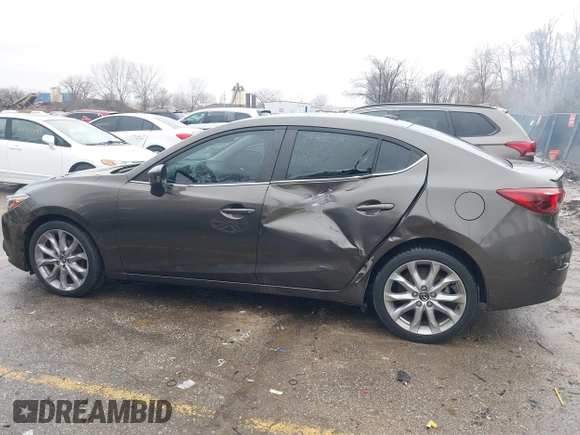 2014 Mazda 3 S Touring with VIN JM1BM1V31E1111499, listed as a IAAI auction lot 41476457 with 109,337 mi miles and . Bid and sale history available at DreamBid. Image 14.