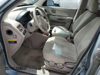 2005 Hyundai Tucson GL with VIN KM8JM12B05U148660, listed as a Copart auction lot 54302805 with 257,233 mi miles and Salvage title. Bid and sale history available at DreamBid. Image 7.