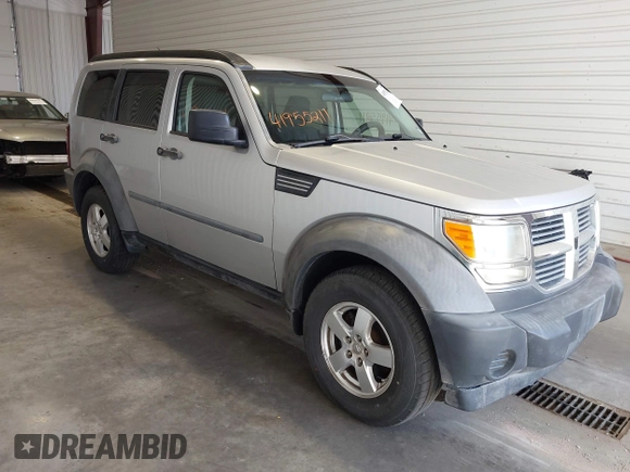 2007 Dodge Nitro SXT z VIN 1D8GT28K17W615978, wystawiony jako IAAI lot #41955211 z przebiegiem 142 741 mil mil oraz . Historia ofert i sprzedaży dostępna na DreamBid. Obrazek 1.
