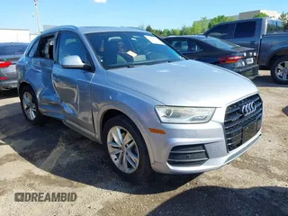 2017 Audi Q3 Premium z VIN WA1ECCFSXHR002623, wystawiony jako IAAI lot #42077132 z przebiegiem 118 511 mil mil oraz . Historia ofert i sprzedaży dostępna na DreamBid. Obrazek 1.