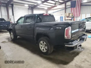 2015 GMC Canyon 4WD SLE with VIN 1GTG6BE38F1258880, listed as a Copart auction lot 57887664 with 142,346 mi miles and Salvage Title. Bid and sale history available at carsss.com. Image 2.
