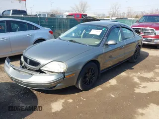 2003 Mercury Sable GS z VIN 1MEFM50243A619761, wystawiony jako IAAI lot #41790150 z przebiegiem 114 522 mil mil oraz . Historia ofert i sprzedaży dostępna na DreamBid. Obrazek 17.