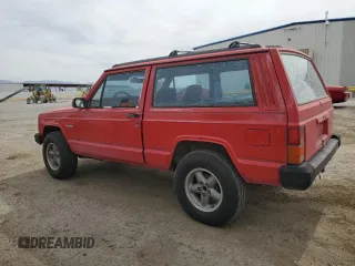 1993 Jeep Cherokee SE with VIN 1J4FT27P2PL619945, listed as a Copart auction lot 59053465 with 222,336 mi miles and Clean title. Bid and sale history available at DreamBid. Image 2.