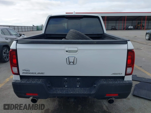 2023 Honda Ridgeline RTL with VIN 5FPYK3F55PB018188, listed as a IAAI auction lot 41952319 with 73,019 mi miles and . Bid and sale history available at DreamBid. Image 16.